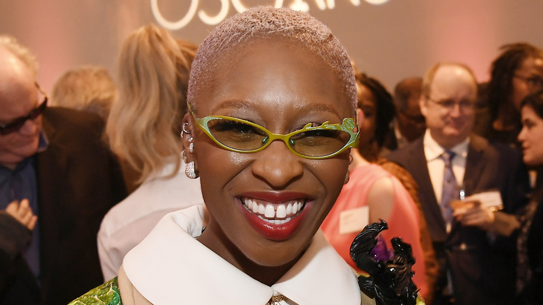 Cynthia Erivo in glasses, laughing