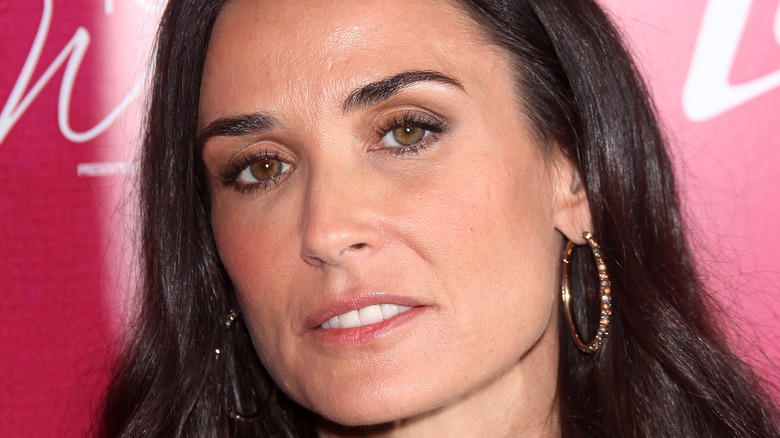 Demi Moore posing at event