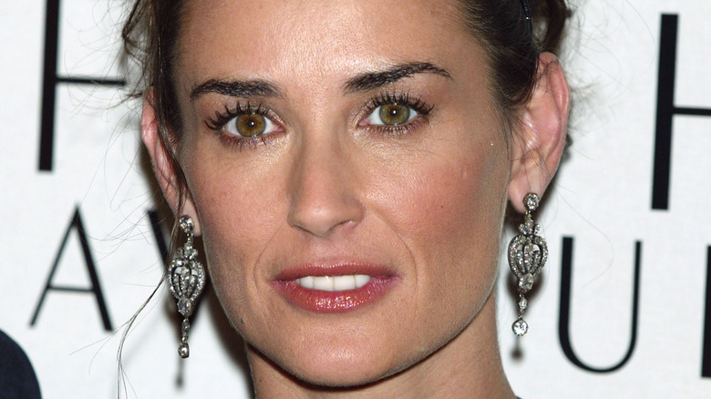 Demi Moore posing at event