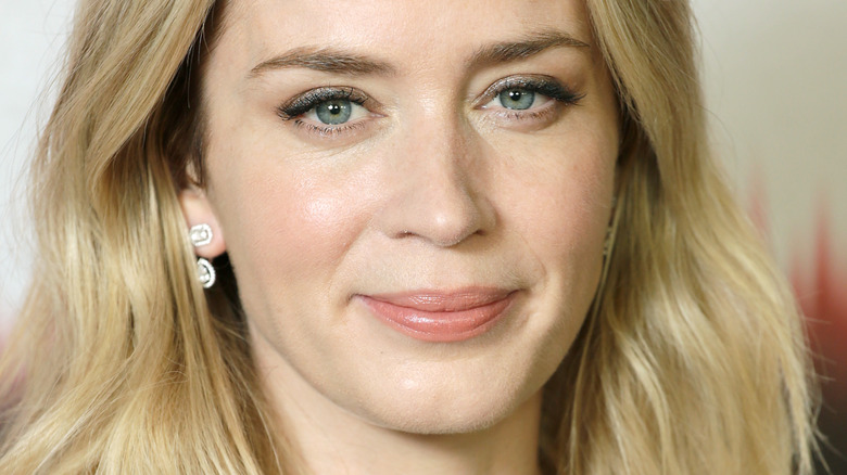 Emily Blunt slightly smiling