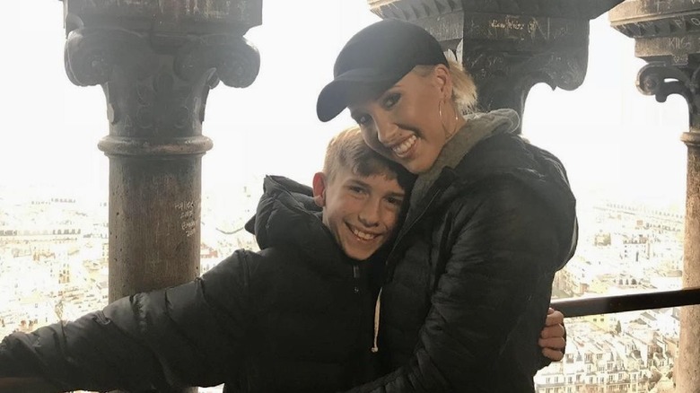 Grayson Chrisley, hugging Savannah Chrisley 