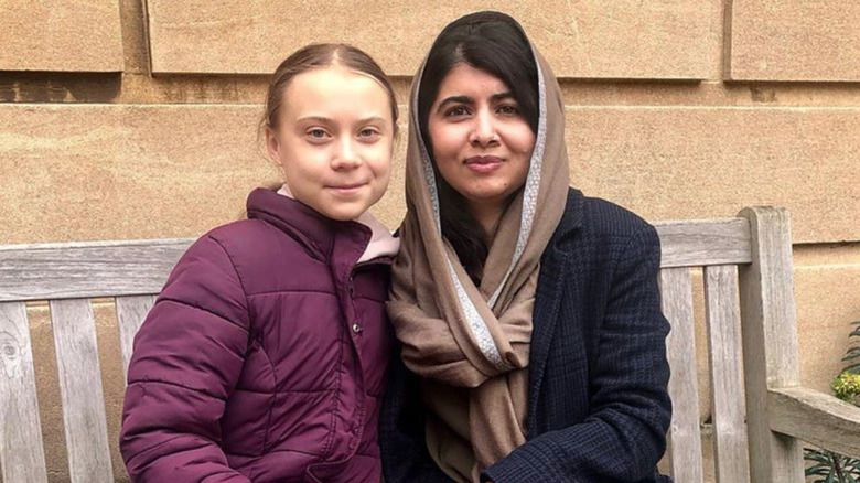 Greta Thunberg and Malala Yousafzai posing together