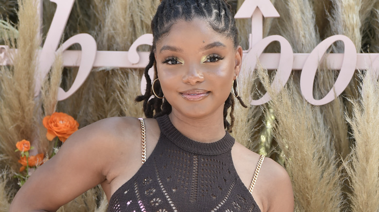 Halle Bailey posing confidently