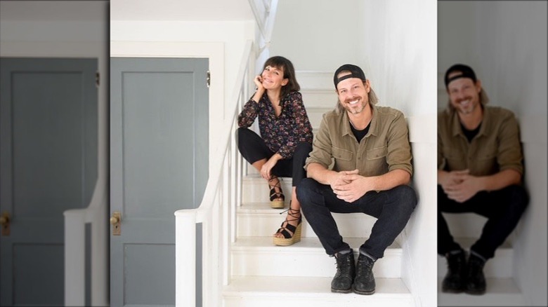 Leanne and Steve Ford sitting on a staircase