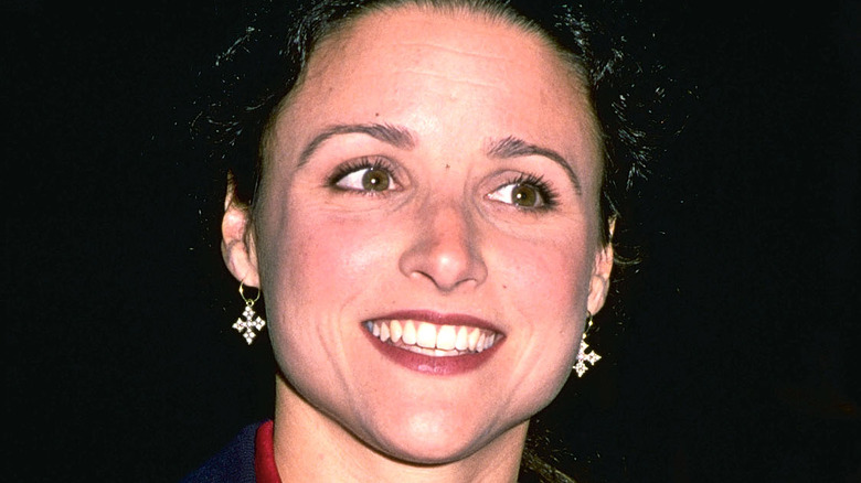 Julia Louis-Dreyfus smiling when she was younger