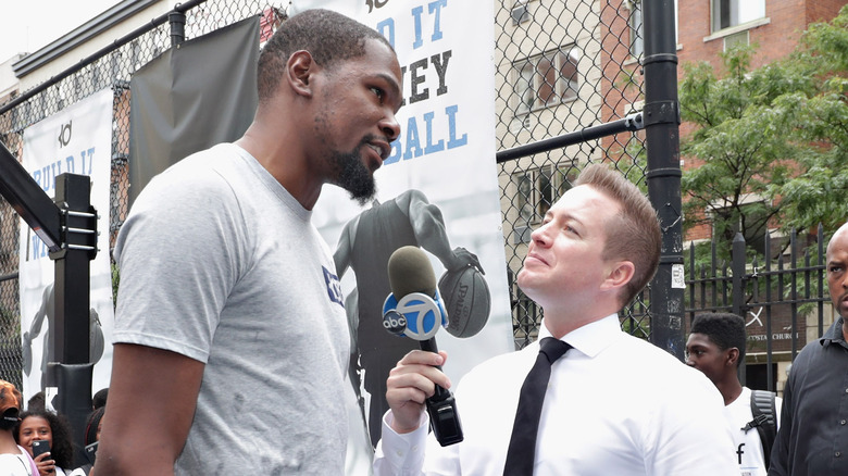Kevin Durant talking to a reporter