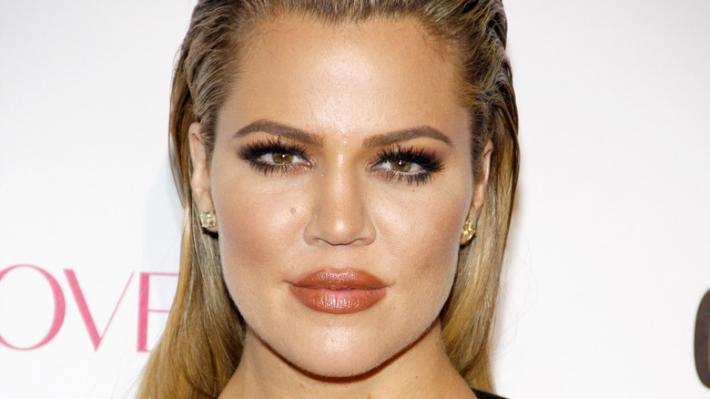 Khloe Kardashian looking at camera