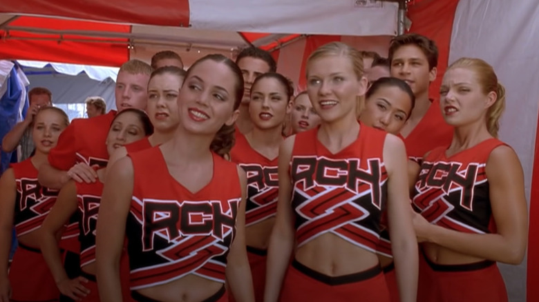 Eliza Dushku, Kirsten Dunst in cheerleading uniforms