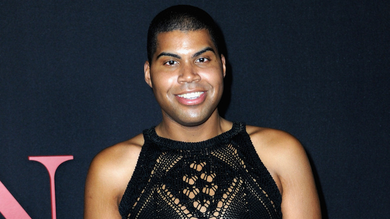 EJ Johnson wearing a mesh dress