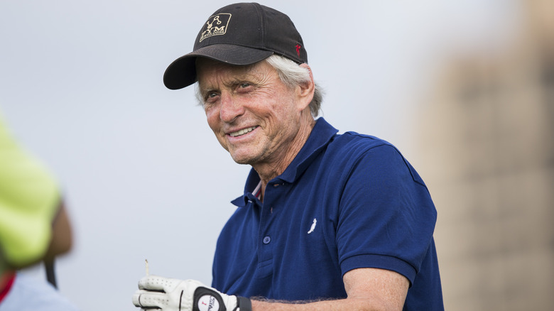 Michael Douglas golfing