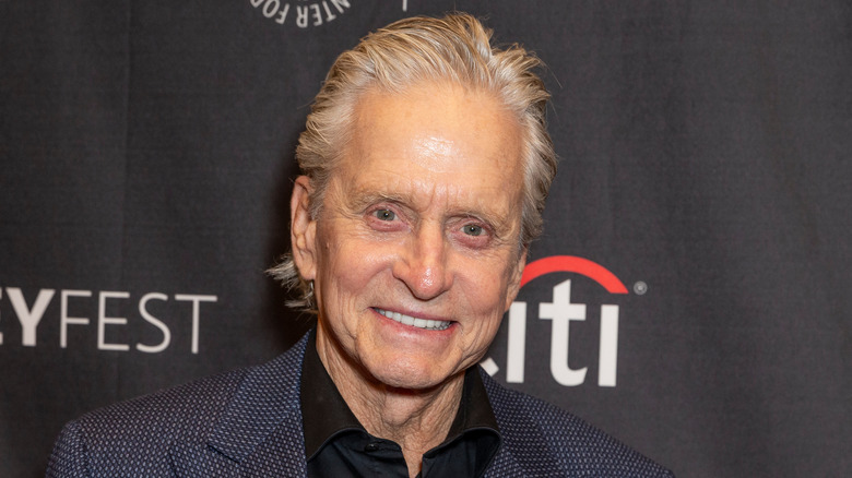 Michael Douglas in a blue suit jacket