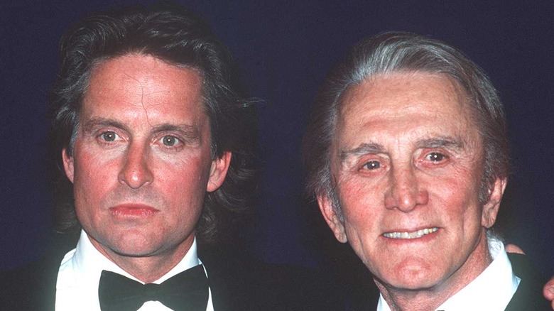 Michael and Kirk Douglas in suits