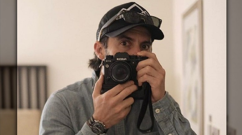 Milo Ventimiglia taking a mirror selfie