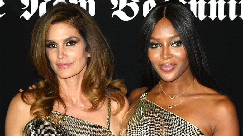 Naomi Campbell posing with Cindy Crawford