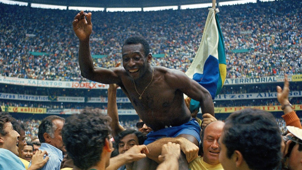 Pele celebrating Brazil's World Cup win in 1970