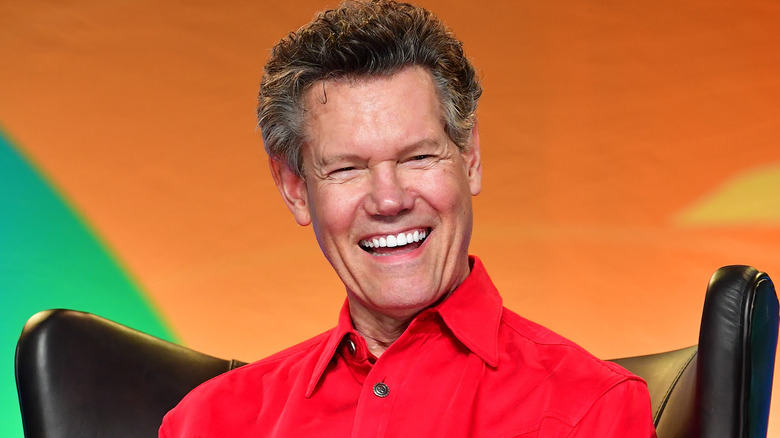 Randy Travis laughing on stage