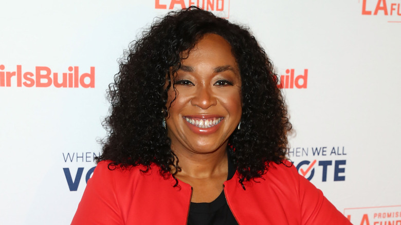 Shonda Rhimes in a red jacket