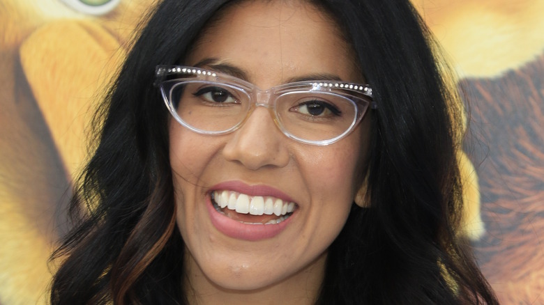 Stephanie Beatriz wearing glasses