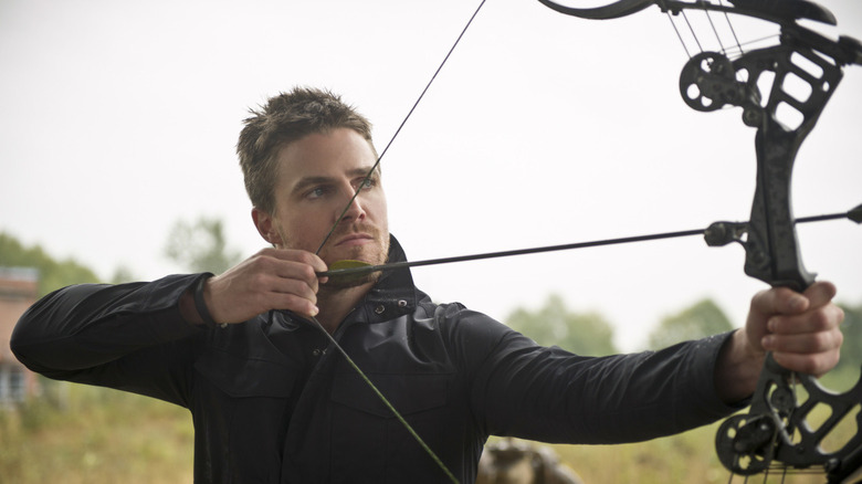 Stephen Amell with bow