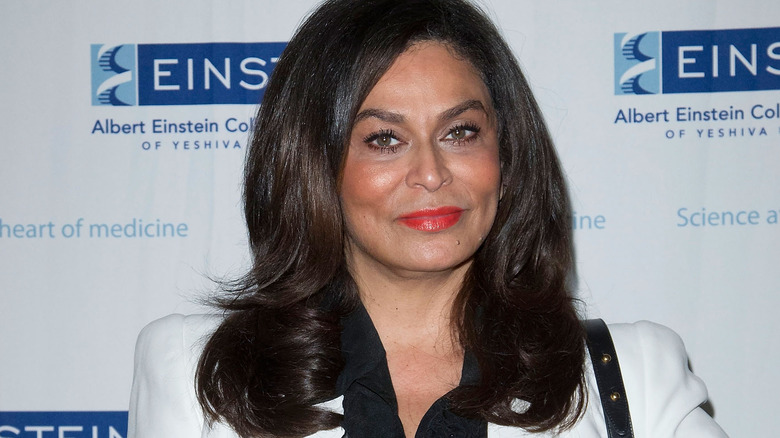 Tina Knowles in white suit