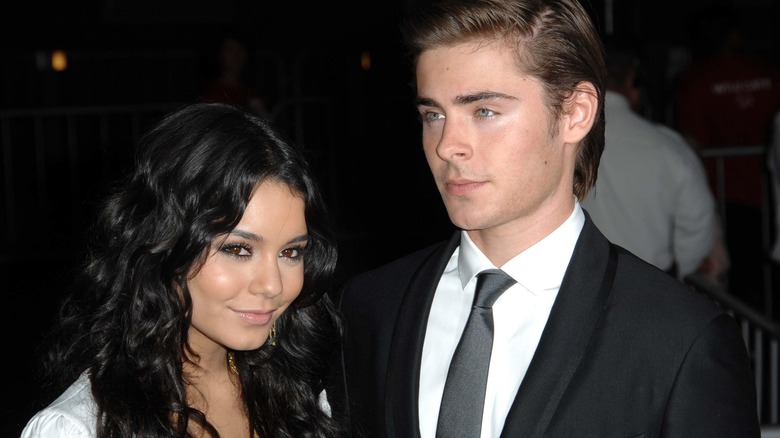 Vanessa Hudgens, Zac Efron, looking distant