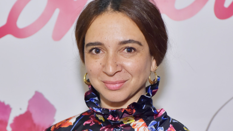 Maya Rudolph smiling at a jewelry launch