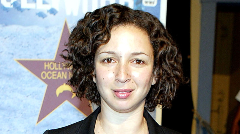 A young Maya Rudolph poses at a fundraiser