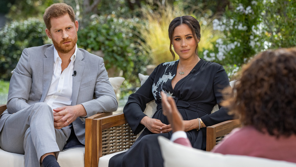 Prince Harry and Meghan Markle being interviewed by Oprah Winfrey