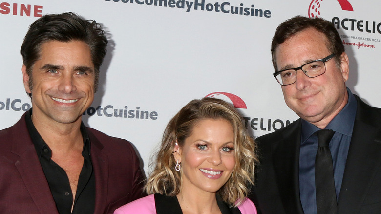 John Stamos, Candace Bure and Bob Saget smiling