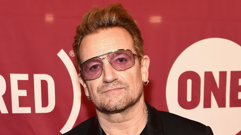 Bono weaering a black suit jacket