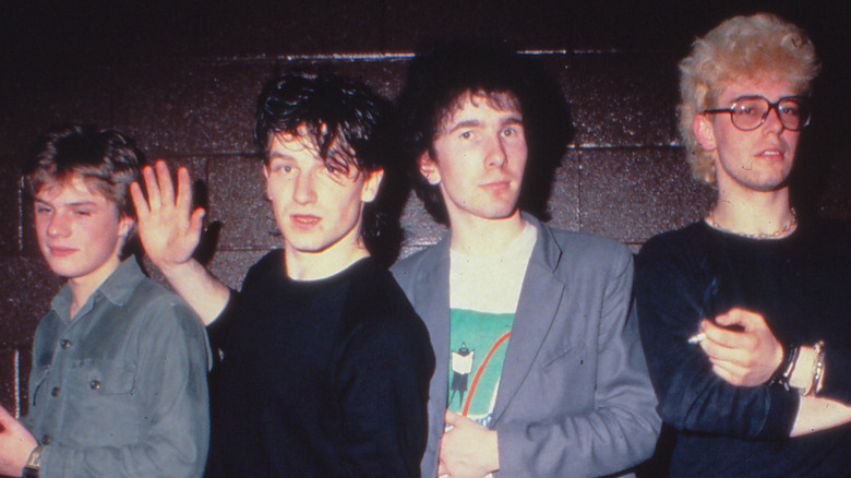 Young U2 posing