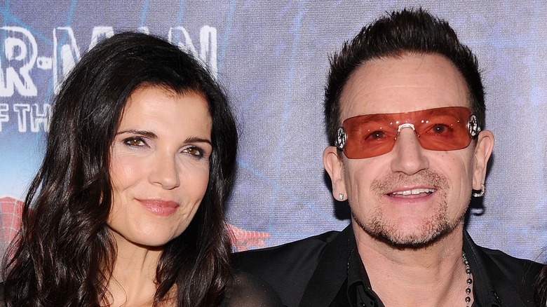 Bono with his arm around wife Ali Hewson