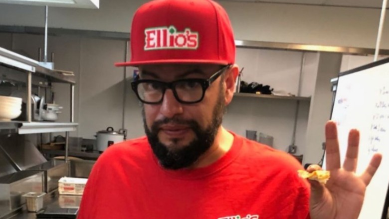 Carl Ruiz in red Ellio's hat