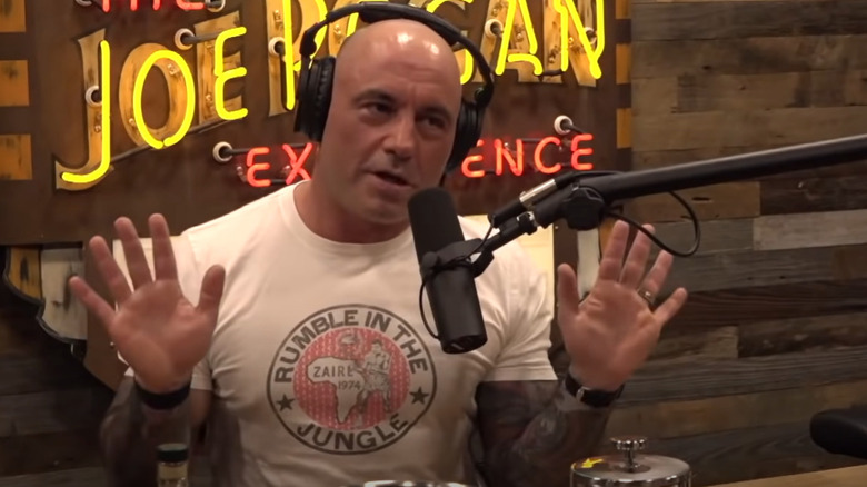 Joe Rogan with hands up