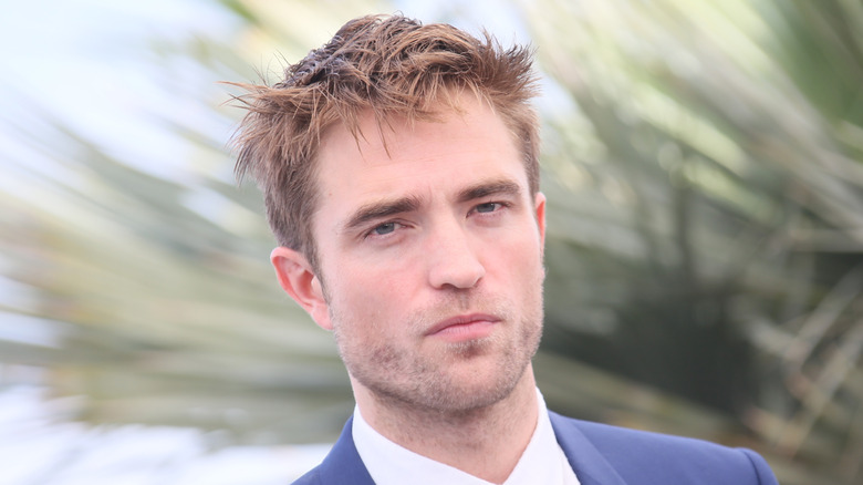 Robert Pattinson with a serious expression