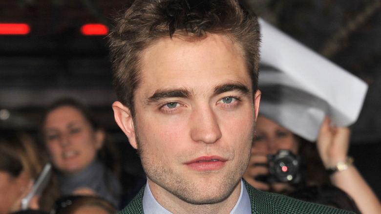 Robert Pattinson with a serious expression