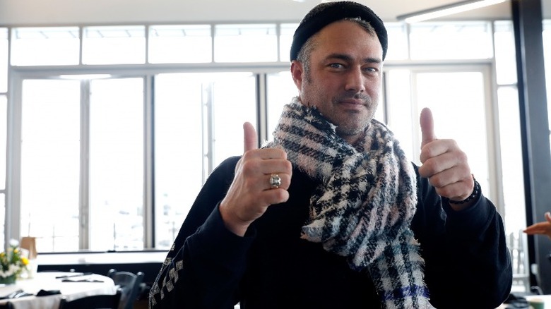 Taylor Kinney giving thumbs up