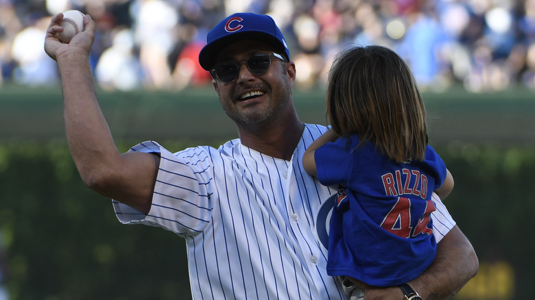 Taylor Kinney throws the first pitch at Wrigley Field