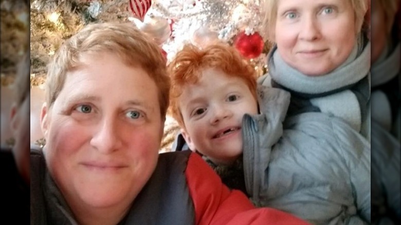 Christine Marinoni and Cynthia Nixon in a selfie with their son