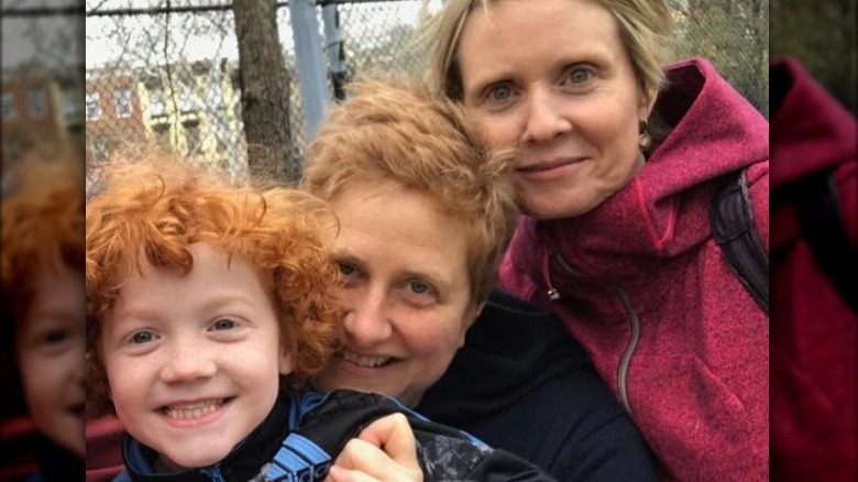 Christine Marinoni and Cynthia Nixon with their son in a selfie