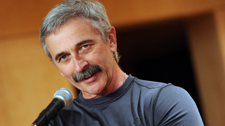 Aaron Tippin with a microphone