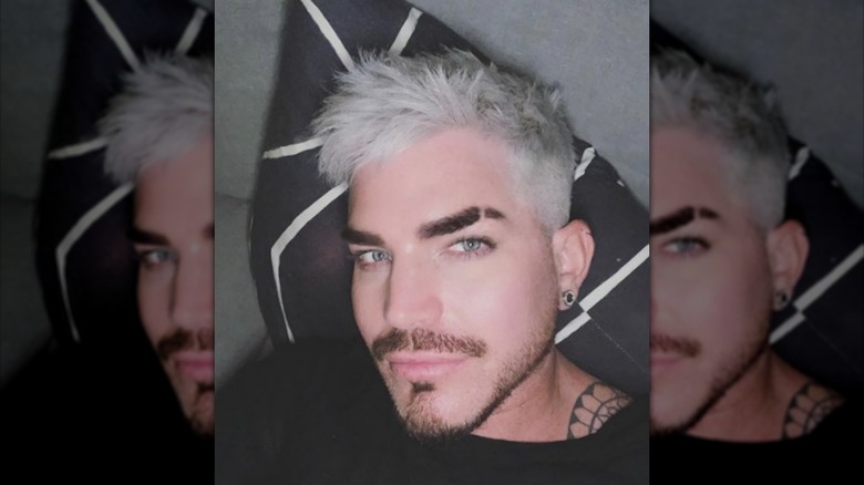 Adam Lambert posing for a selfie