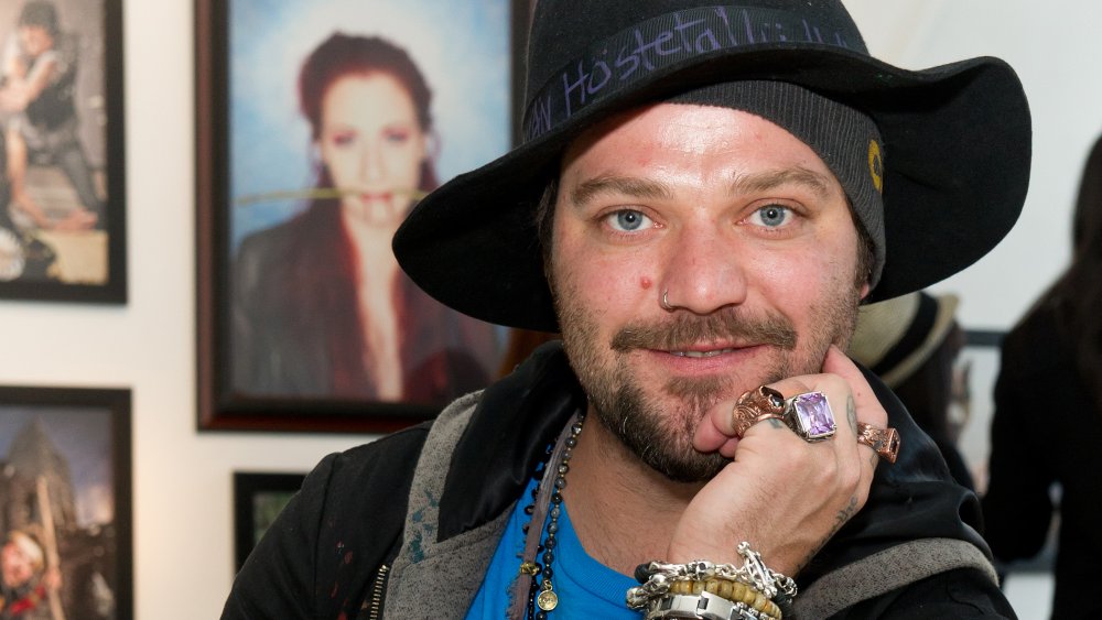 Bam Margera leaning on hand