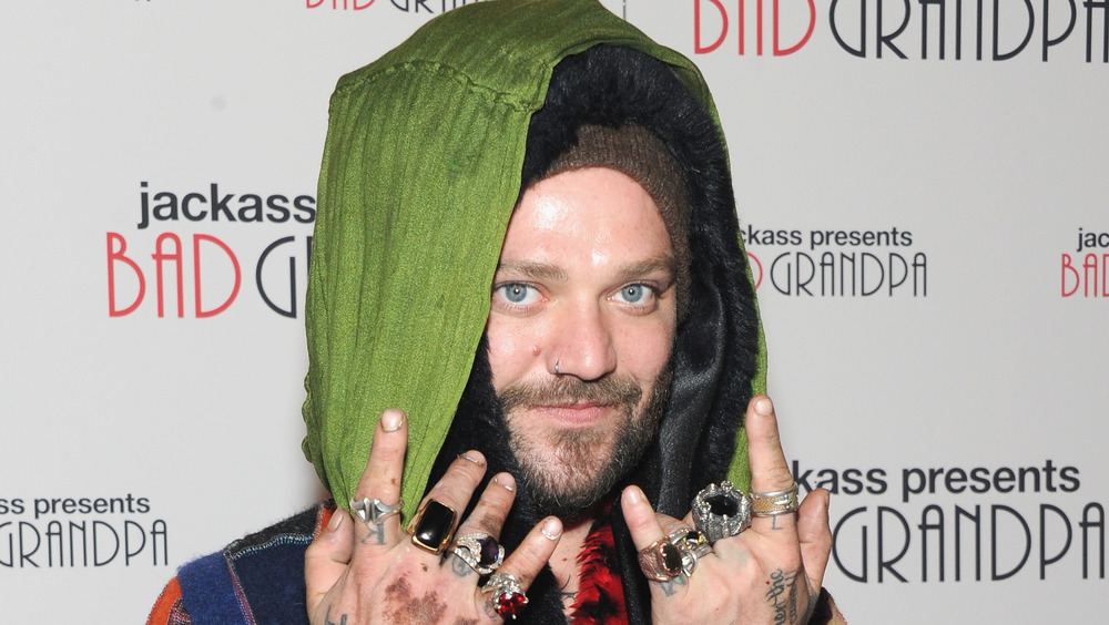 Bam Margera posing with hand gestures