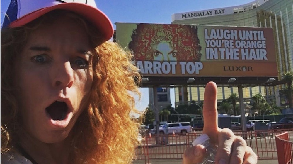 Carrot Top selfie in front of Vegas residency sign