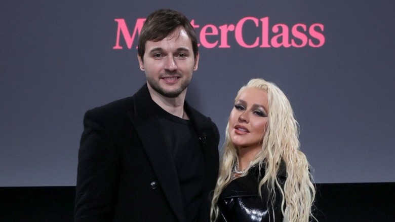 Matthew Rutler and Christina Aguilera smiling