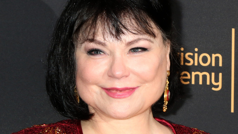 Delta Burke smiling red dress