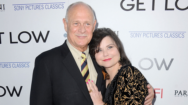 Delta Burke snuggling Gerald McRaney