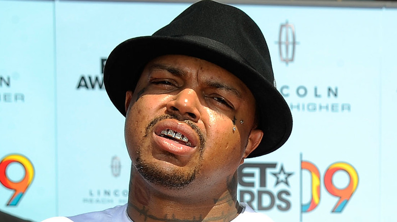 DJ Paul wearing a fedora 