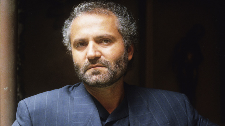 Gianni Versace posing for cameras